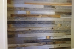 Salvaged barn wood plank wall